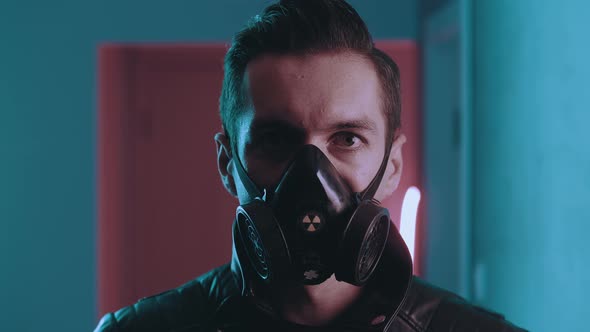 Portrait of Brutal Man in a Respirator at Night Over Neon Lights in the Style of Cyberpunk alt