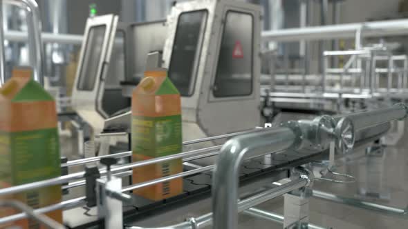 Industrial Machinery Transports Juice Packs To Manufacturing Line At Plant alt