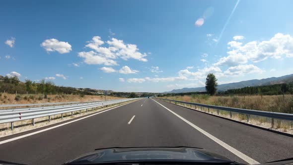 Summer Road Trip on Europe Firstperson View of a Moving Car on a Highway alt