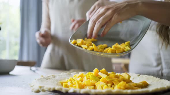 Woman on Kitchen Prepare Pumpkin Pie