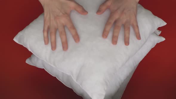 White Pillow on a Red Background alt