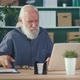 Elder Man Becomes Upset After Getting Bad News From Received Order - VideoHive Item for Sale