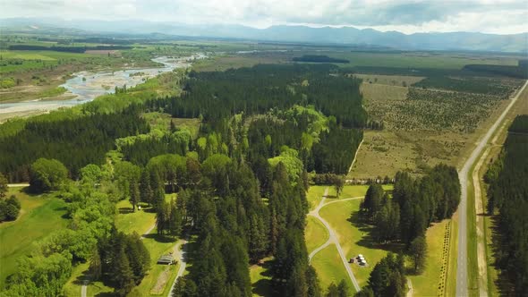 Drone Fly Over Amuri Plain and Balmoral Camp Near Culverden - Dolly ShotRiver Floodplain in New Zea alt