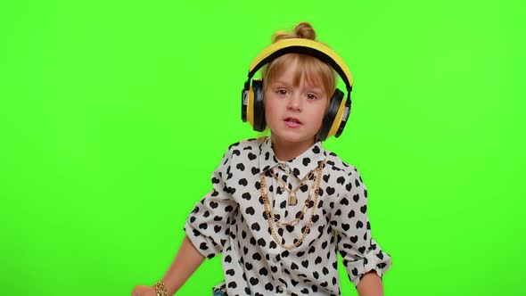 Cheerful Cute Blonde Child Kid Listening Music Via Headphones Dancing Disco Fooling Having Fun Party alt