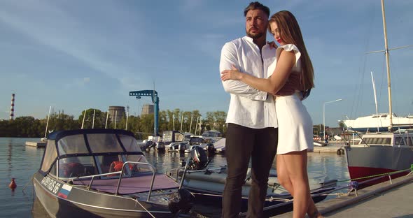 Romantic Couple Having Date on Embankment at Sunset