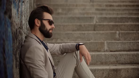 Overwhelmed Exhausted Stressed Man. Tired Worker Overworked On Laptop. Tired Businessman In City. alt