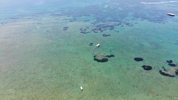 Beautiful aerial footage of the clear ocean sea off the Greek coast of Greece in Corfu alt