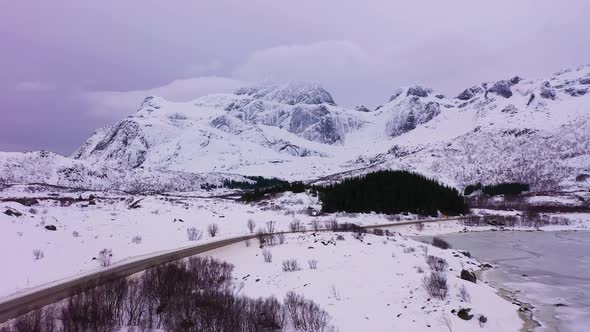 Road and Mountains in Winter. Lofoten Islands, Norway. Aerial View alt