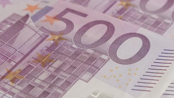 Slow tilt background of red 500 euro banknotes in a row 4K 2160p 30fps UltraHD    footage - EU paper alt
