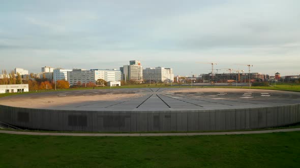 The Velodrome Indoor Track Cycling Arena in Berlin, Germany at Daylight, Aerial Wide View Above alt