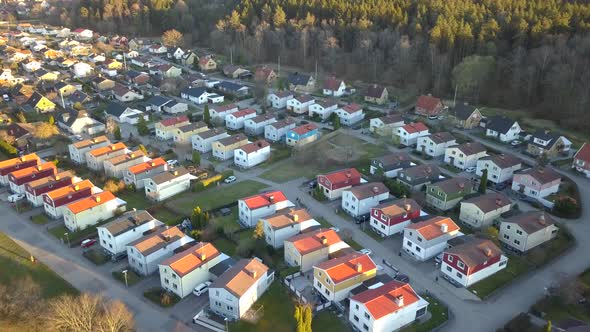 Aerial view of suburban area with residential houses. alt
