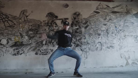 Modern dance in an old building - graffiti background alt