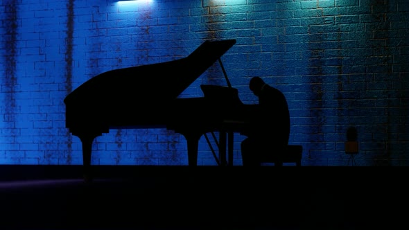 Man Playing Piano in Dark Room