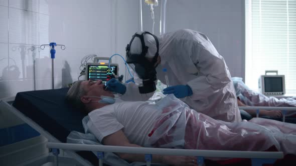 Mouth Swab of a Lying Patient is Being Taken By a Doctor alt