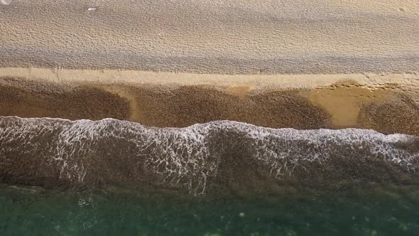 Aerial View From Above on Azure Sea and Pebbles Beach alt