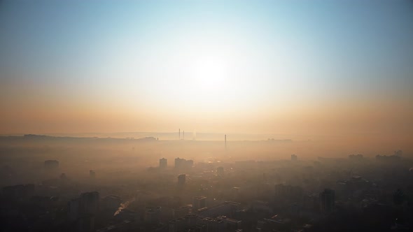 Aerial drone view of Chisinau. Panorama view of multiple buildings. Fog and sun. Moldova alt