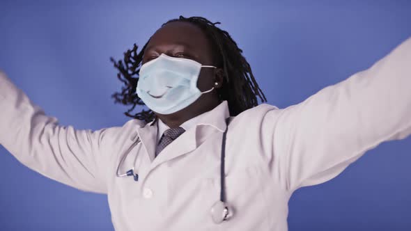 Dancing Cheerful Happy African Doctor in Face Mask with Smile Drawing alt