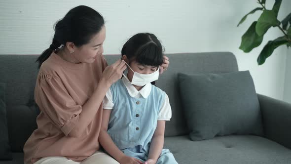 Portrait of family, happy cute affectionate adopted little kid girl hugging foster care parent alt