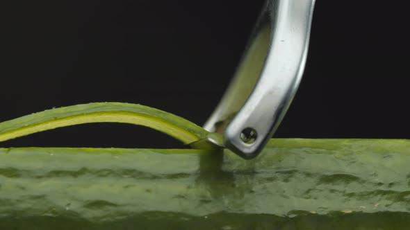 Slicing a Cucumber with a Special Vegetable Knife alt