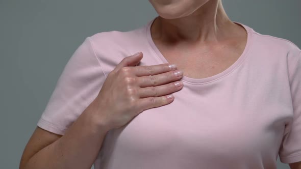 Female Touching Breast, Disease Awareness, Risk of Cancer, Self Examination