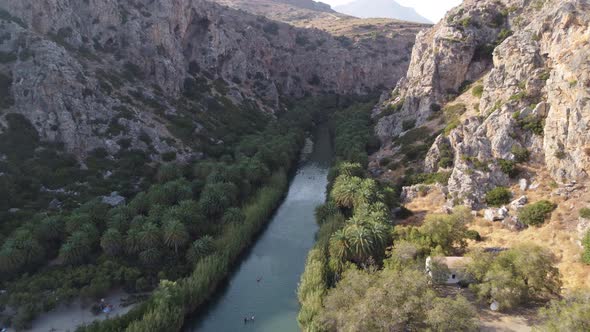 Panorama of Preveli Beach at Libyan Sea River and Palm Forest Southern Crete  Greece alt