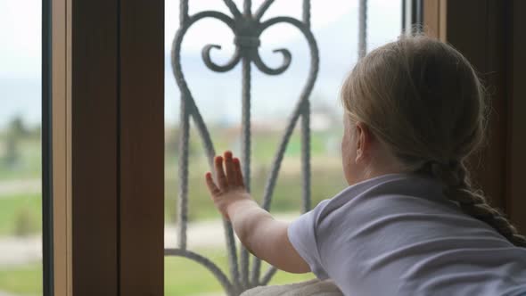 Stay at Home Quarantine Coronavirus Pandemic Prevention, Girl Looking Out of the Window Without