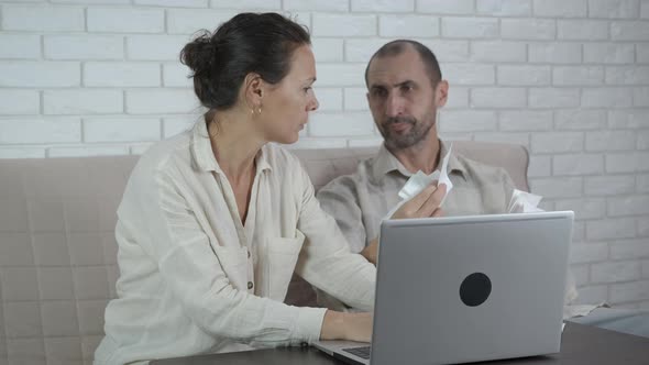 Calculate taxes. Husband and wife count checks.  alt