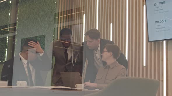 Multiethnic Marketing Team Working on Project in Office alt