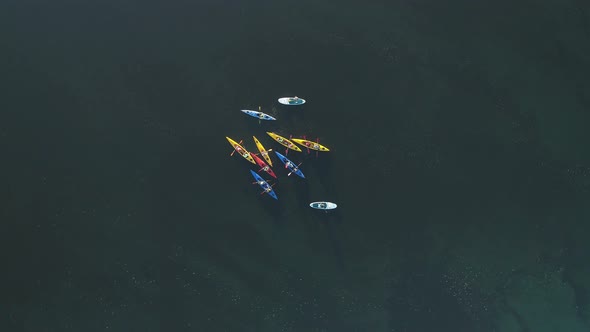 Aerial Drone Footage. Tourists Are Kayaking. Top Down View