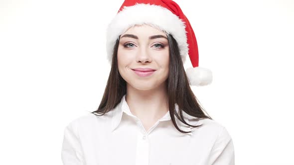 Slow Motion Young Attractive Businesswoman Blowing Silver Confetti Celebrating for Christmas and New alt