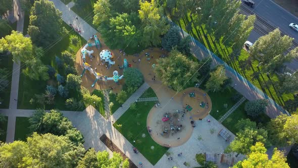 Children Playground in Park Area in City in Sunny Evening, Aerial View