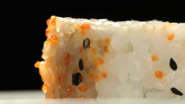 Sushis rotating close up in studio