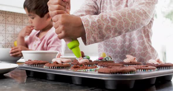 Children making cupcakes
