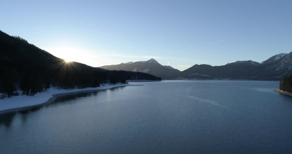 Flight over Walchensee in winter, Bavaria, Germany alt
