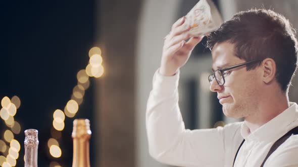 Close Up Portrait of Unhappy and Lonely Caucasian Guy Sitting at Table During Birthday Party alt