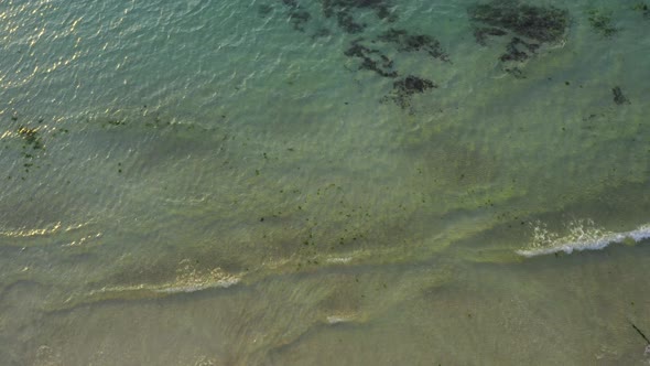 Beach waves and sunset scenery. drone shot. Jeju Island alt
