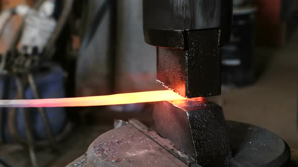 Using Pneumatic Hammer To Shape Hot Metal. Making the Sword Out of Metal