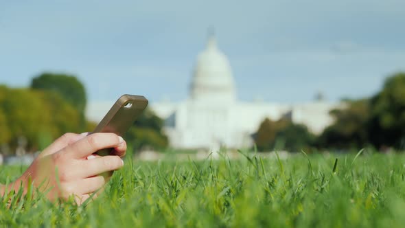 On the Lawn, Against the Background of the Capitol in Washington alt
