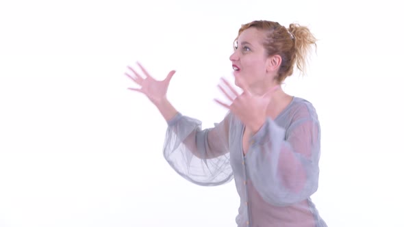 Happy Beautiful Blonde Woman Snapping Fingers and Looking Surprised alt