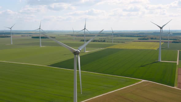Wind turbine in a green field alt