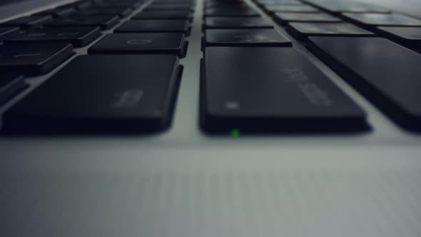 Male Hand Typing on Laptop. Closeup Man Using Laptop Computer alt