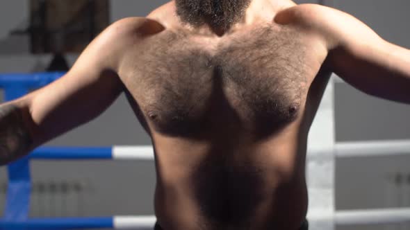 Portrait of a Professional Boxer in the Ring. Slow Motion alt