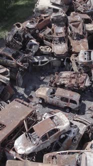 Vertical Video of Wardestroyed Cars in Irpin Ukraine alt