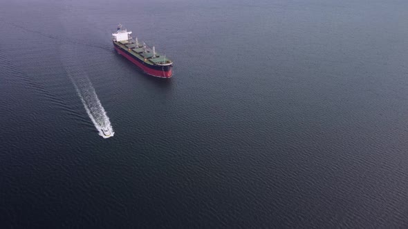 Large General Cargo Ship Tanker Bulk Carrier Aerial View alt