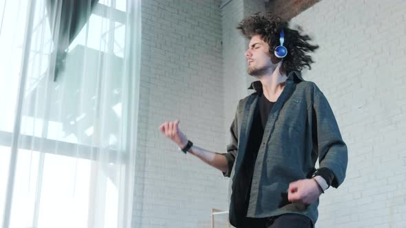 Mna Listening to Music Dancing  Singing and Playing Air Guitar Happy and Crazy alt