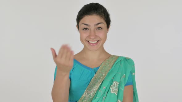 Indian Woman Pointing at the Camera and Inviting White Background alt