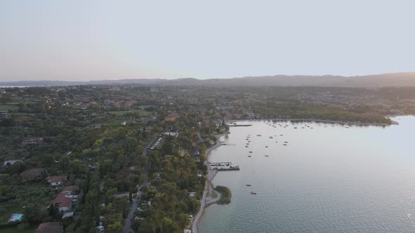 Salo Italian town aerial panorama, tourist resort by Lake Garda famous promenade alt