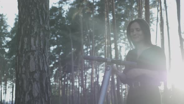 Woman sharing or renting electric transportation. Businesswoman using electric kick scooter alt