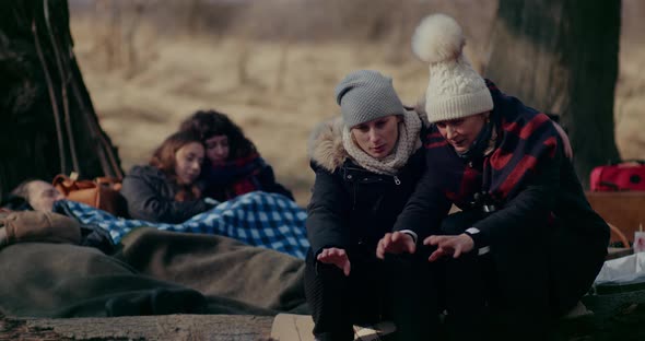 Refugees Feeling Cold In Forest During RussianUkrainian War alt