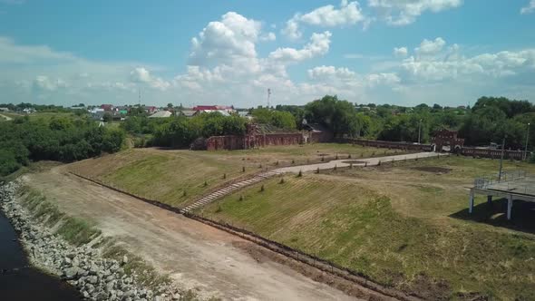 Aerial View of Old Dilapidated Monastery Building From Red Brick